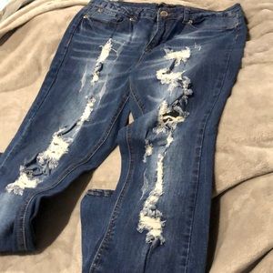 High waisted distressed jeans